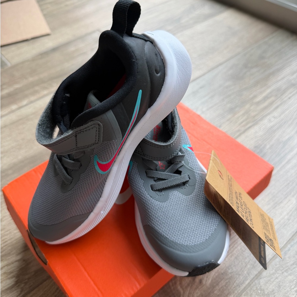 Nike Gray Kids Sneakers with Red & Teal Swoosh